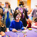 Young girls participate in Family Day colouring acitivities at the  Minneapolis Institute of Art. Photo credit:  @MinneapolisInstituteofArts on Flickr.